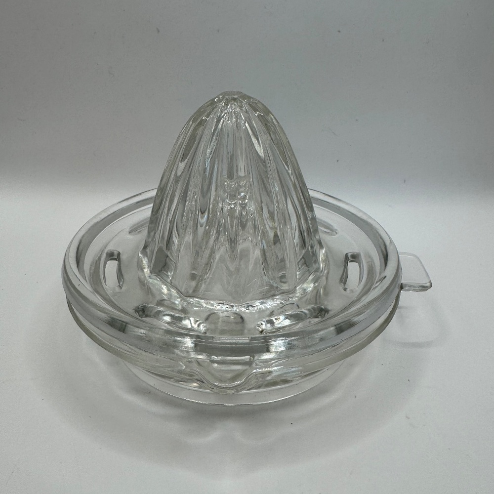 Vintage double stacked glass citrus juicer.